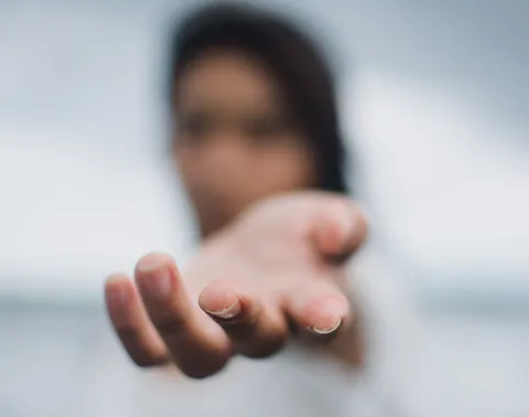 GIRL WITH OUTSTRETCHED ARM